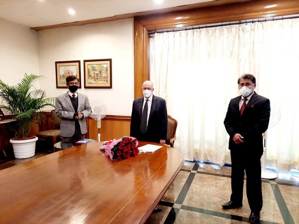 Mr Jovial Vaghela and Mr Mark Clive sharing Christmas Greetings  Lt Governor Delhi Mr Anil  Baijal